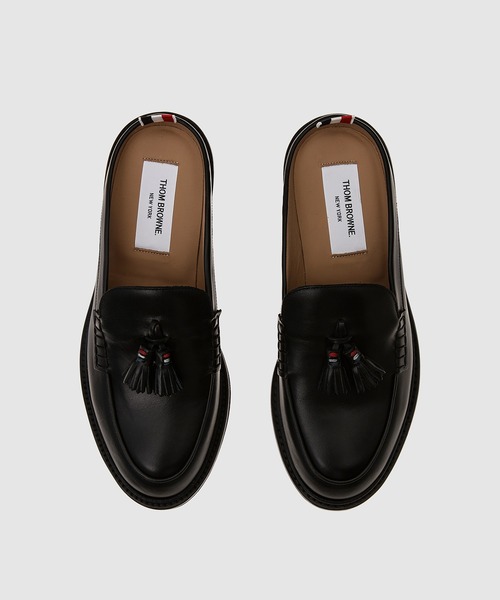 THOM BROWNE（トムブラウン）の「TASSEL LOAFER MULE W/ MICRO SOLE IN VITELLO CALF LEATHER（ローファー・メンズ・ブラック・7/8/9/10）」の5枚目の写真