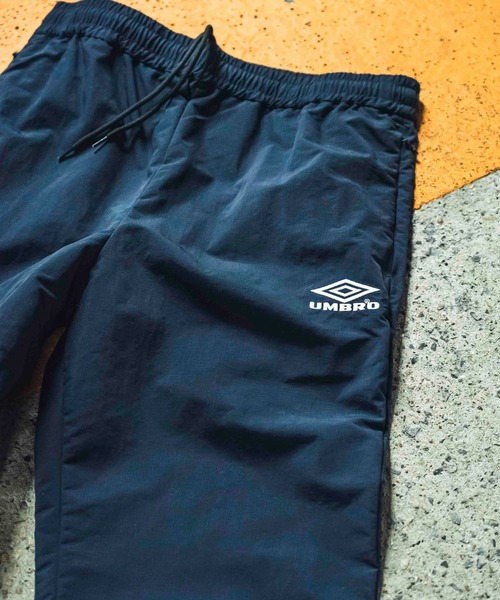 UMBRO(アンブロ)の「『別注』UMBRO×DOORS TRACK PANTS(その他パンツ・メンズ・ネイビー/ブラック・MEDIUM/LARGE)」の2枚目の写真