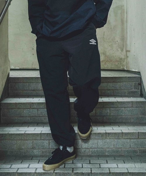 UMBRO(アンブロ)の「『別注』UMBRO×DOORS TRACK PANTS(その他パンツ・メンズ・ネイビー/ブラック・MEDIUM/LARGE)」の6枚目の写真