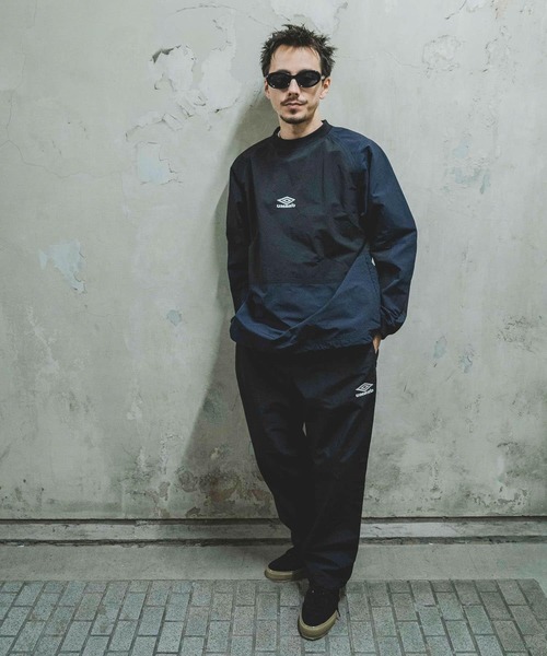 UMBRO(アンブロ)の「『別注』UMBRO×DOORS TRACK PANTS(その他パンツ・メンズ・ネイビー/ブラック・MEDIUM/LARGE)」の11枚目の写真