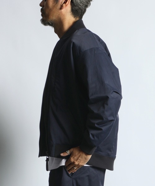 The DUFFER of ST.GEORGE（ザダファーオブセントジョージ）の「N/C PUDDING MA-1 JACKET：コットンナイロン 中綿入り MA-1ジャケット（MA-1・メンズ・ブラック/ネイビー・SMALL/MEDIUM/LARGE/X-LARGE）」の9枚目の写真