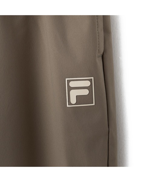 FILA(フィラ)の「ELEY KISHIMOTO×FILA TRACK PANTS / イーリーキシモト×フィラ トラックパンツ(その他パンツ・レディース・ダークカーキ/ブラック・S/M/L/XL)」の6枚目の写真
