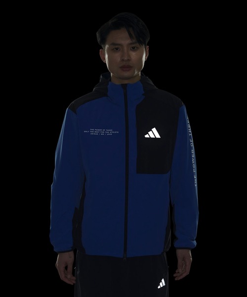 adidas(アディダス)の「アディダスアダプテーション レギュラーフィット ストレッチ ウーブン フード付き フルジップ トラックトップ / ジャージ / アディダス adidas(マウンテンパーカー・メンズ・ブルー・XX-LARGE/3XL/LARGE/MEDIUM/SMALL/X-LARGE/X-SMALL)」の4枚目の写真