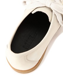 MHL.（エムエイチエル）の「MHL ARMY TRAINER(MHL SHOP限定
