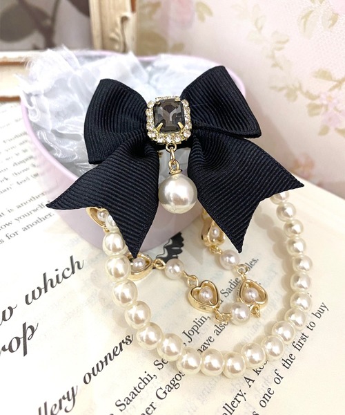 ROJITA（ロジータ）の「リボン付パールブレスレット（ブレスレット・レディース・ブラック/ピンク/アイボリー/レッド/ブルー/パープル・FREE）」の3枚目の写真