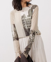 emesuelee（エメスーリー）の「グラフィックプリント シアー クルーネック トップス パワーネット（Tシャツ/カットソー）」