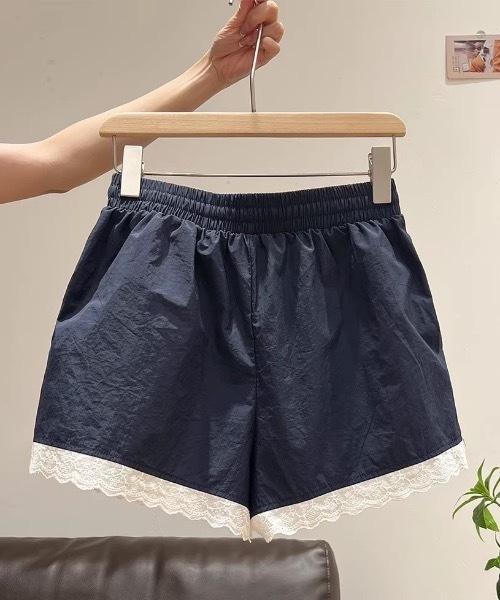 Teem Store(チームストア)の「サイドラインデザインレース付きナイロンショートパンツ(その他パンツ・レディース・ネイビー・M/L)」の6枚目の写真