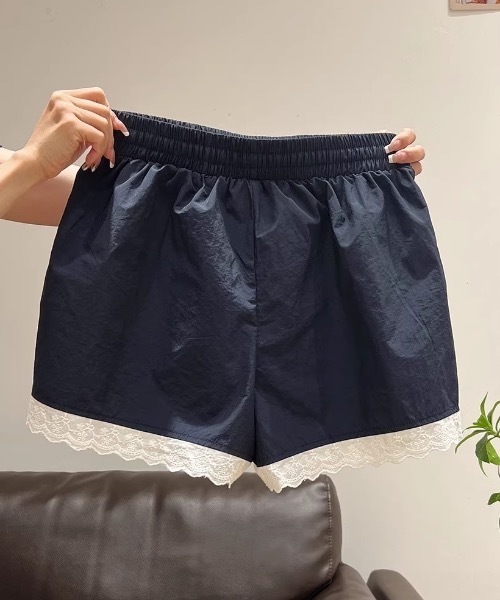 Teem Store(チームストア)の「サイドラインデザインレース付きナイロンショートパンツ(その他パンツ・レディース・ネイビー・M/L)」の8枚目の写真