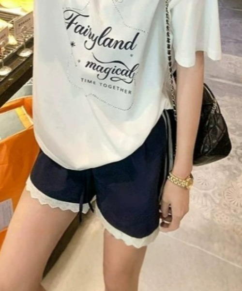 Teem Store(チームストア)の「サイドラインデザインレース付きナイロンショートパンツ(その他パンツ・レディース・ネイビー・M/L)」の2枚目の写真