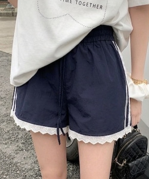Teem Store(チームストア)の「サイドラインデザインレース付きナイロンショートパンツ(その他パンツ・レディース・ネイビー・M/L)」の10枚目の写真