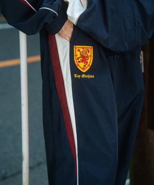 UMBRO(アンブロ)の「【ムラサキスポーツ限定】UMBRO/アンブロ トラックパンツ ユニセックス セットアップ対応 MD3726FWMSPT02(その他パンツ・メンズ・ネイビー/ブラック・XL/L/M/S)」の5枚目の写真