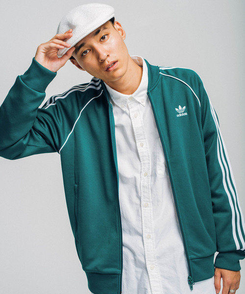 adidas�i�A�f�B�_�X�j�́u�g���b�N�g�b�v [SST TRACK TOP] �A�f�B�_�X�I���W�i���X �W���[�W�i�W���[�W�j�v�b�_�[�N�O���[��