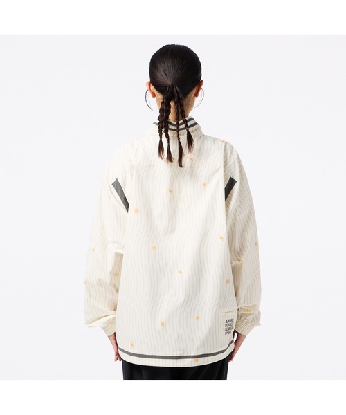 hummel(ヒュンメル)の「hummel/ヒュンメル HMP クロスジャケット(ナイロンジャケット・レディース・アイボリー/ブラック/ブルー・S/M/L/XL)」の7枚目の写真
