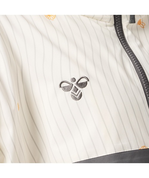 hummel(ヒュンメル)の「hummel/ヒュンメル HMP クロスジャケット(ナイロンジャケット・レディース・アイボリー/ブラック/ブルー・S/M/L/XL)」の9枚目の写真