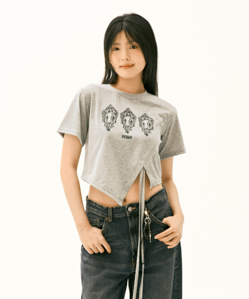 And Again(アンドアゲイン)の「キーホールグラフィックストリングTシャツ(グレー)(Tシャツ/カットソー・レディース・その他・FREE)」の1枚目の写真
