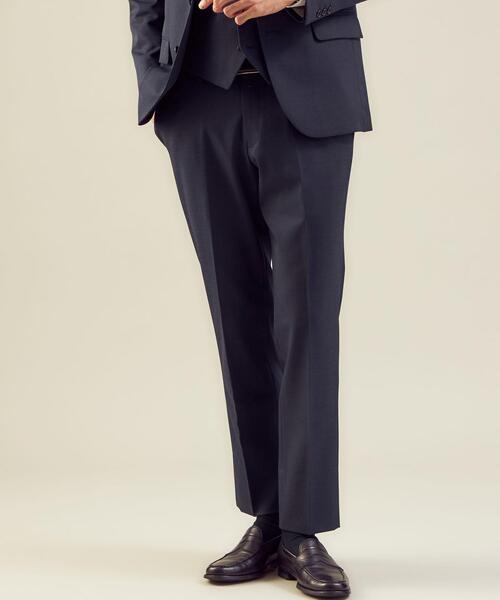 WORK TRIP OUTFITS GREEN LABEL RELAXING(ワークトリップアウトフィッツグリーンレーベル リラクシング)の「WTO TWPUサージ千鳥マジコンスリム スーツパンツ -ウォッシャブル・防シワ・ストレッチ- **(スーツパンツ・メンズ・ネイビー/ダークグレー・S/76/XL/88/XXS/70/XS/72/L/84/M/80)」の1枚目の写真