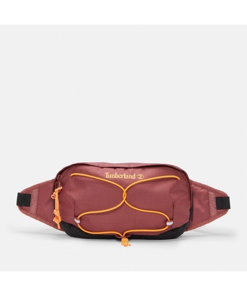 Timberland(ティンバーランド)の「オールジェンダー パフォーマンス ハイキング スリング バッグ(ボディバッグ/ウエストポーチ・メンズ・ブラック/レッド系その他・FREE)」の2枚目の写真