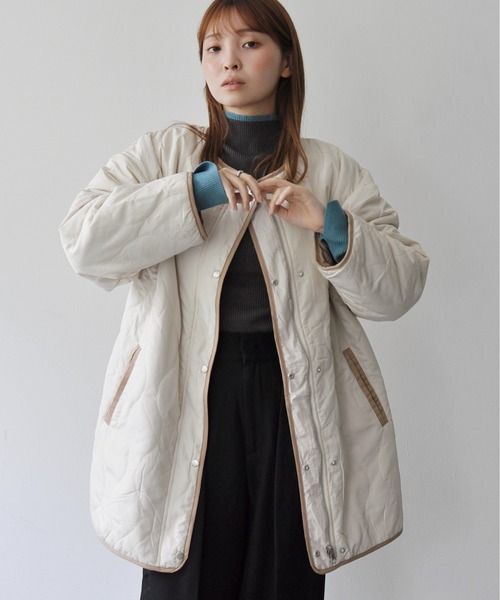 Meli rich（メリーリッチ）の「ひょうたんキルトリバーシブルサイドスリットキルティングコート（ミリタリージャケット・レディース・アイボリー/カーキ・FREE）」の2枚目の写真