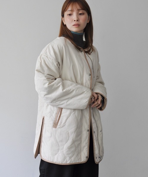 Meli rich（メリーリッチ）の「ひょうたんキルトリバーシブルサイドスリットキルティングコート（ミリタリージャケット・レディース・アイボリー/カーキ・FREE）」の6枚目の写真