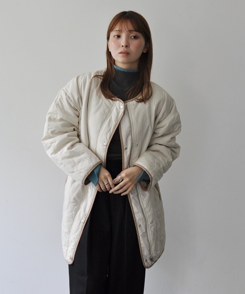 Meli rich（メリーリッチ）の「ひょうたんキルトリバーシブルサイドスリットキルティングコート（ミリタリージャケット・レディース・アイボリー/カーキ・FREE）」の8枚目の写真
