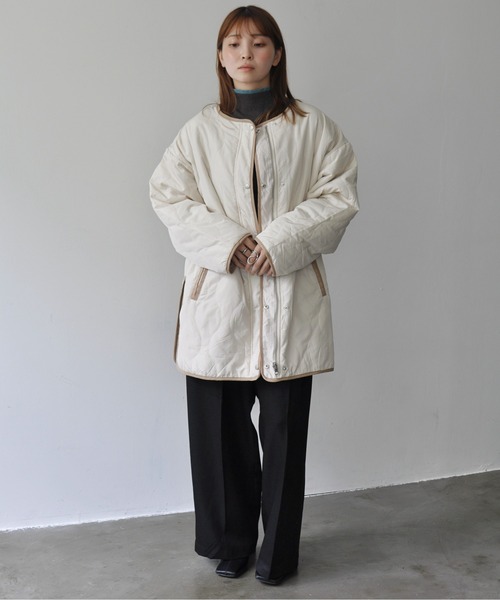 Meli rich（メリーリッチ）の「ひょうたんキルトリバーシブルサイドスリットキルティングコート（ミリタリージャケット・レディース・アイボリー/カーキ・FREE）」の11枚目の写真