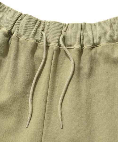 suade（スエード）の「WASHED LOGO PANTS [PIGMENT KHAKI]（スウェットパンツ・レディース・その他・LARGE/MEDIUM/X-LARGE）」の3枚目の写真