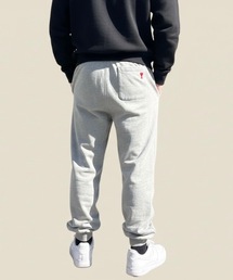 AMI Alexandre Mattiussi（アミアレクサンドルマテュッシ）の「AMI PARIS / BACK POKET HEART JOGGER PANTS（スウェットパンツ）」