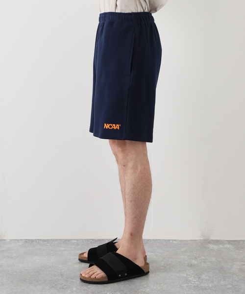 NCAA(エヌシーエーエー)の「【NCAA×JOURNAL STANDARD】別注 ロゴ刺繍スウェットショーツ(スウェットパンツ・メンズ・ネイビー/グリーン/アイボリー・MEDIUM/LARGE)」の15枚目の写真