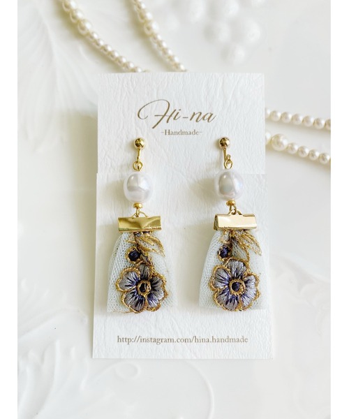 tone(トーン)の「【Hi-na】バロックパール×フラワー刺繍リボンタッセル イヤリング(MA)(イヤリング・レディース・ブルー/イエロー・FREE)」の1枚目の写真