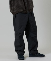 【UNFRM OUTDOOR STANDARD:ユニフォームアウトドアスタンダード】COTTON-POLYESTER INSULATED OVER PANTS/ドローコード付きインサレーションパンツ