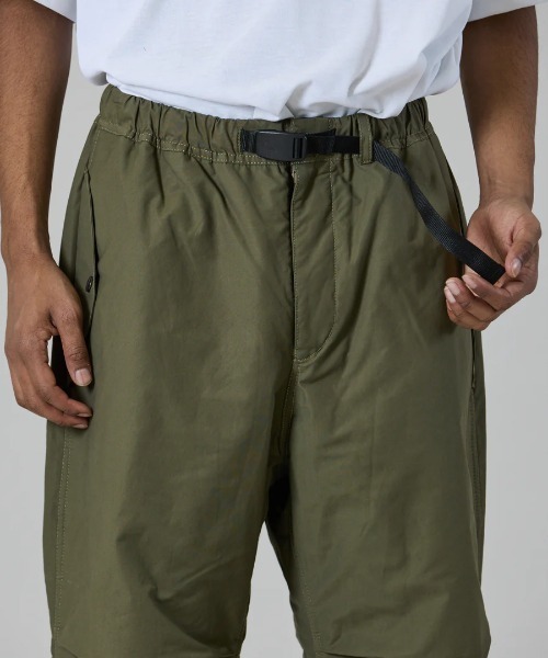 UNFRM OUTDOOR STANDARD(ユニフォームアウトドアスタンダード)の「【UNFRM OUTDOOR STANDARD:ユニフォームアウトドアスタンダード】COTTON-POLYESTER INSULATED OVER PANTS/ドローコード付きインサレーションパンツ(その他パンツ・メンズ・ブラック/オリーブ・SMALL)」の6枚目の写真