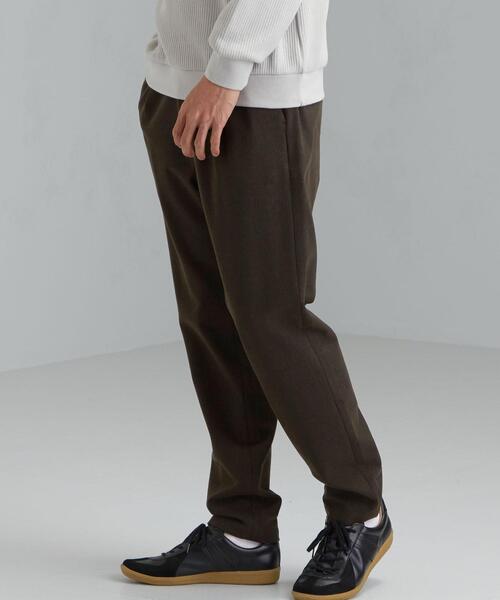 green label relaxing(グリーンレーベルリラクシング)の「2WAY ブラッシュツイル 1プリーツ ユーティリティー パンツ < 機能性 / ストレッチ >(その他パンツ・メンズ・ネイビー/ブラック/ダークブラウン/ダークグレー・S/M/L/XL)」の1枚目の写真
