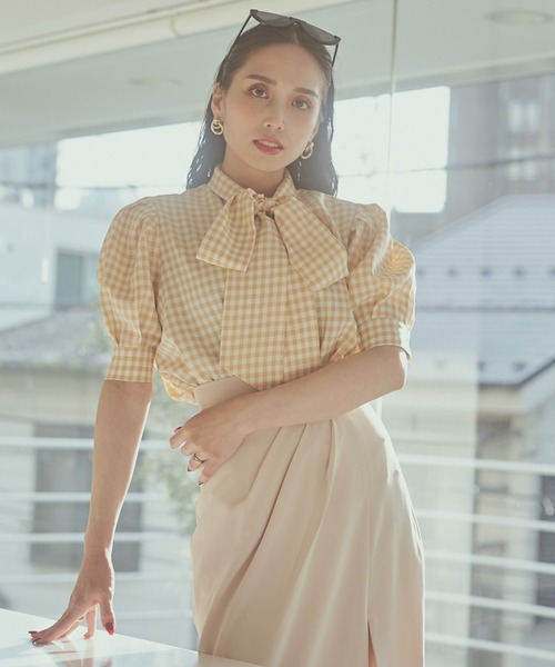 Elleia（エレイア）の「ギンガムチェックリボンブラウス（シャツ