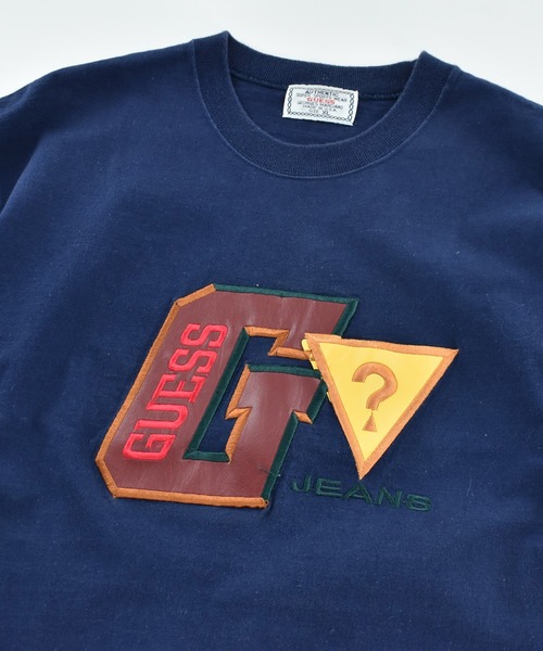 Guess(ゲス)の「【USED】90’s GUESS レザーパッチ ロゴ Tシャツ USA製(Tシャツ/カットソー・メンズ・ネイビー・X-LARGE)」の2枚目の写真