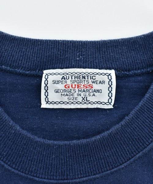Guess(ゲス)の「【USED】90’s GUESS レザーパッチ ロゴ Tシャツ USA製(Tシャツ/カットソー・メンズ・ネイビー・X-LARGE)」の4枚目の写真