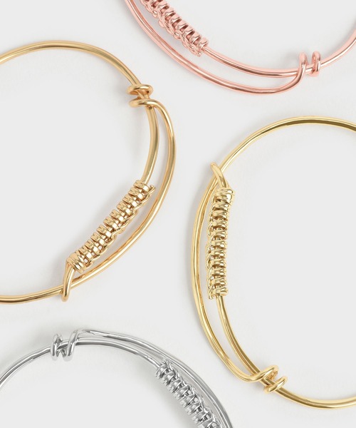 CHARLES & KEITH(チャールズ & キース)の「ツイストバングル ブレスレット / Twist Bangle Bracelet(ブレスレット・レディース・ゴールド系その他2/シルバー・FREE)」の9枚目の写真