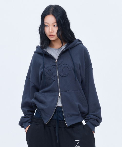 DAUSPICE(ディーオスピス)の「(DUC) Symbol Hoodie Zip-up Vintage Black(パーカー・レディース・ブラック・MEDIUM/LARGE/X-LARGE)」の19枚目の写真