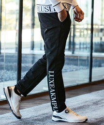 LUXEAKMPLUS(リュクスエイケイエムプラス)ゴルフ 防風ヘムロゴストレッチロングパンツ