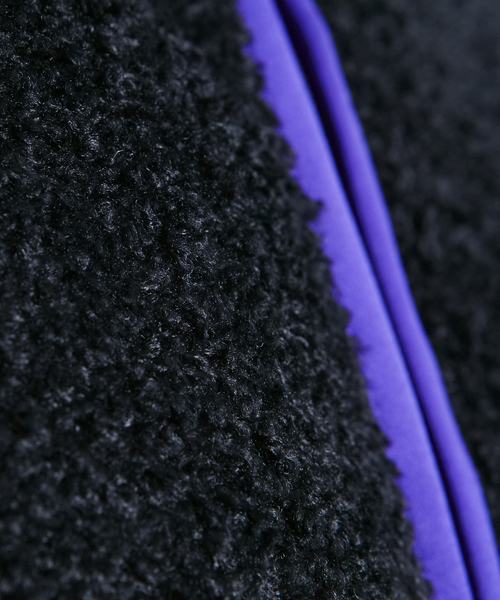 X-girl（エックスガール）の「X-girl×WILD THINGS　MONSTER FLEECE REVERSIBLE JACKET（マウンテンパーカー・レディース・ブラック・1/2）」の10枚目の写真