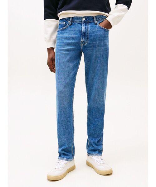 TOMMY HILFIGER(トミーヒルフィガー)の「テーパードハーレムストレートジーンズ(デニムパンツ・メンズ・ブルー・30inch/36inch/34inch/32inch)」の1枚目の写真