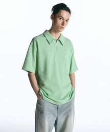 INSILENCE（インサイロンス）の「Textured half-zip polo LIME GREEN（ポロシャツ）」