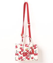 COACH（コーチ）の「カーゴ トート バッグ 20・チェリー プリント