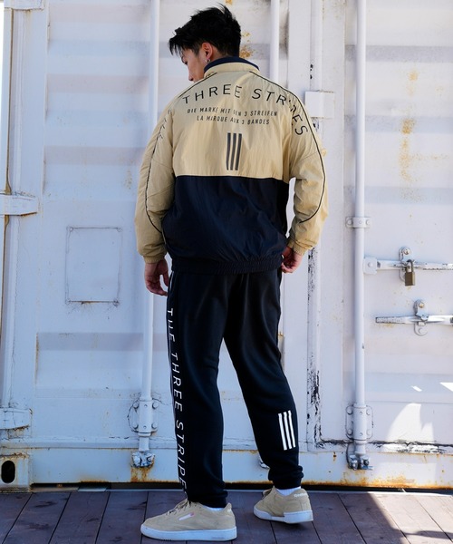 adidas(アディダス)の「adidas/アディダス ウーブンジャケット スリーストライプス/バックプリント 2トーンジャケット/裏起毛 オーバーサイズ/ユニセックス CU358(ナイロンジャケット・メンズ・ブラック/ブラック系その他2/ブラック系その他3・3XL/M/2XL/L/XL)」の18枚目の写真