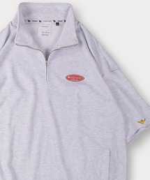 【(What it isNt) ART BY MARK GONZALES/ワットイズイズント マークゴンザレス】オーバルロゴハーフジップTシャツ/バックプリント/ワンポイント/ビッグシルエット