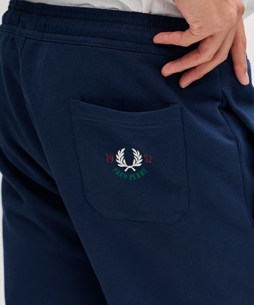FRED PERRY(フレッドペリー)の「1952 Sweat Shorts/刺繍ロゴスウェットショートパンツ(スウェットパンツ・メンズ・ブルー・S/M)」の5枚目の写真