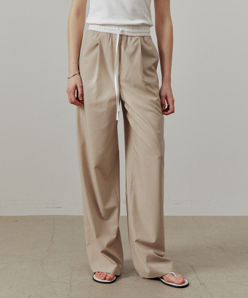 ARTID(アルティーダ)の「配色ポイントストリングワイドパンツ_BEIGE(デニムパンツ・レディース・ベージュ・MEDIUM/SMALL)」の1枚目の写真
