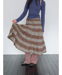 MUWM（ムウム）の「ツーウェイボタンシャーリングスカート2way Button Shirring Skirt (ブラウン)（スカート）」