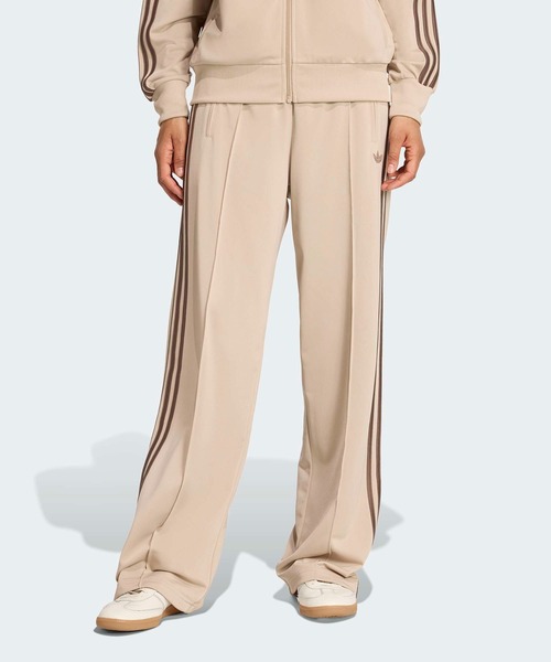 adidas(アディダス)の「【adidas(アディダス)】FIREBIRD LOOSE TRACK PANTS(その他パンツ・レディース・ベージュ系その他2・M/S)」の1枚目の写真