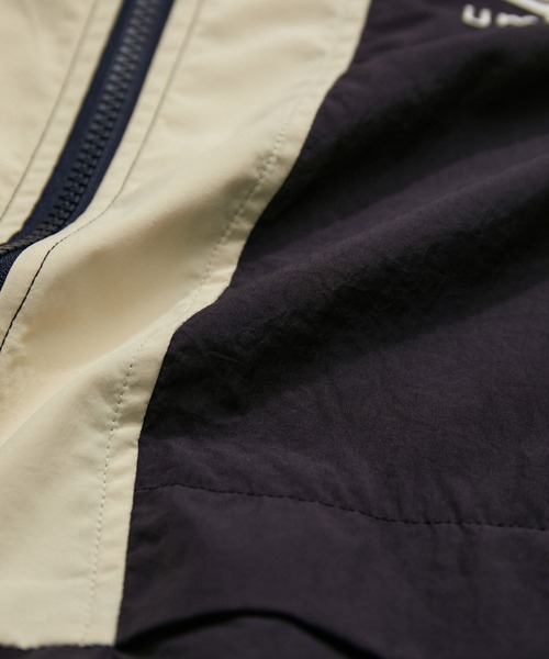 ADAM ET ROPE'（アダムエロペ）の「【UMBRO for ADAM ET ROPE'】TRACK JK（その他アウター・レディース・ネイビー/キナリ・M）」の20枚目の写真