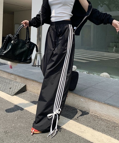 HALEY PESCA（ヘーリーペスカ）の「HALEY PESCA/ルーズデザイン　リボン付きトラックパンツ（スウェットパンツ・レディース・ブラック・SMALL/MEDIUM/LARGE）」の8枚目の写真